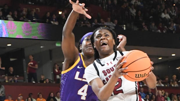 LSU Tigers’ Flau’jae Johnson defends South Carolina Gamecocks’s Ashlyn Watkins during the SEC Tournament final.